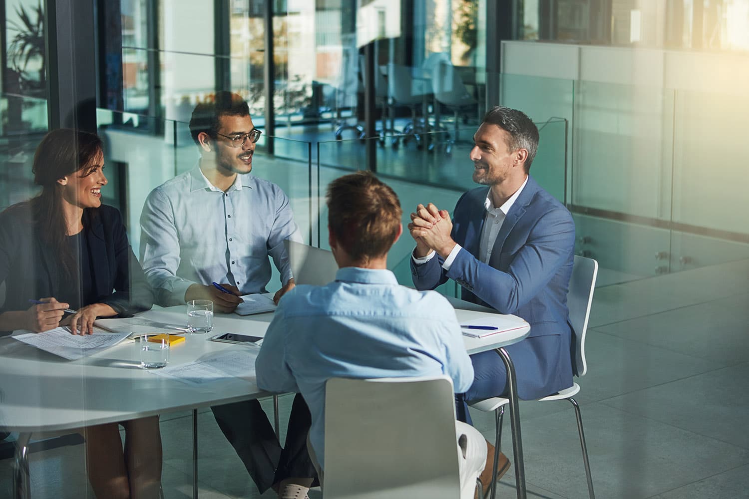 Business people, meeting and discussion for corporate planning, strategy or brainstorming at the office. Group of employee workers in business meeting, team planning or collaboration at the workplace.